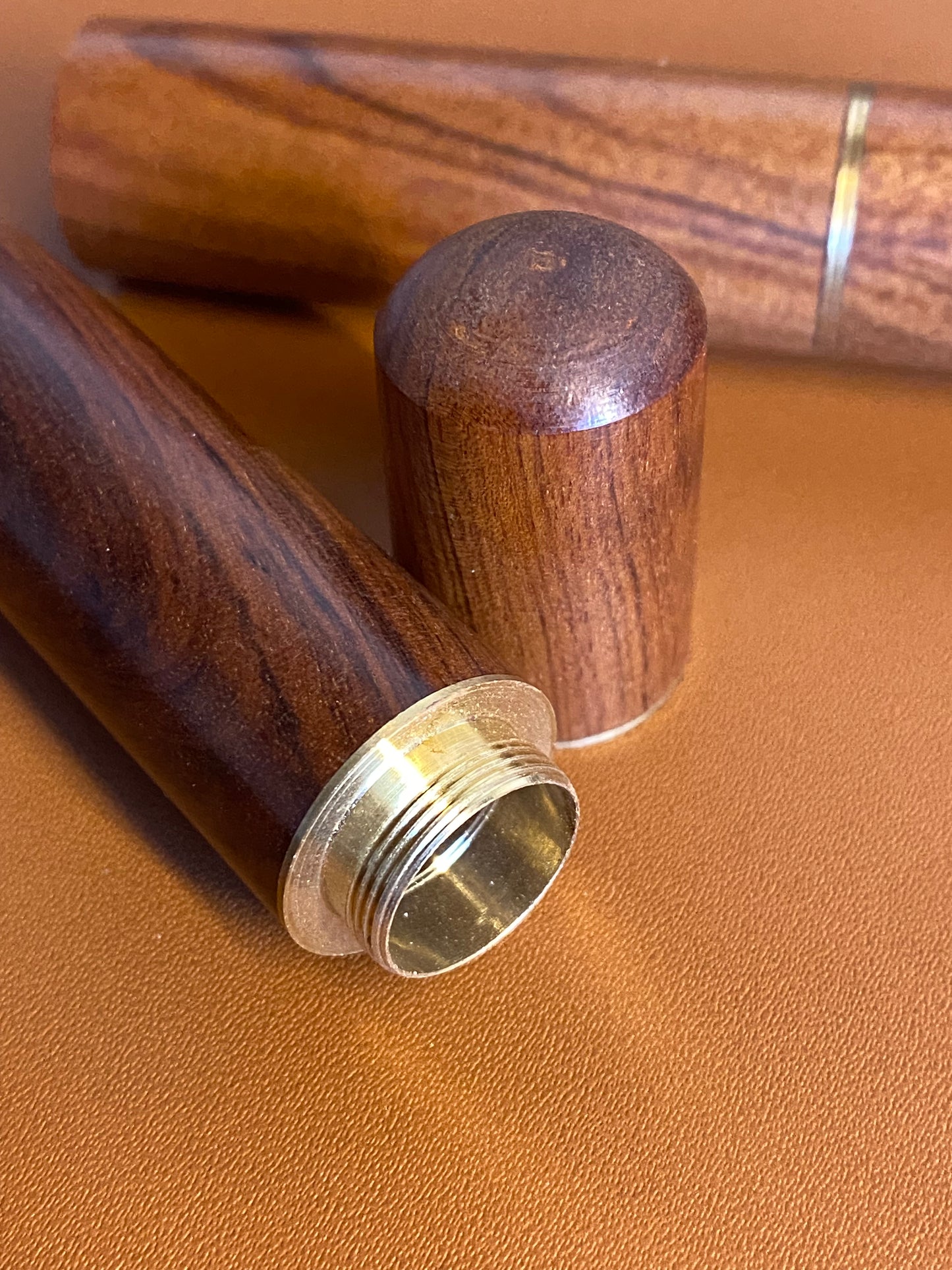Wooden storage container for saddlery needles with screw lid