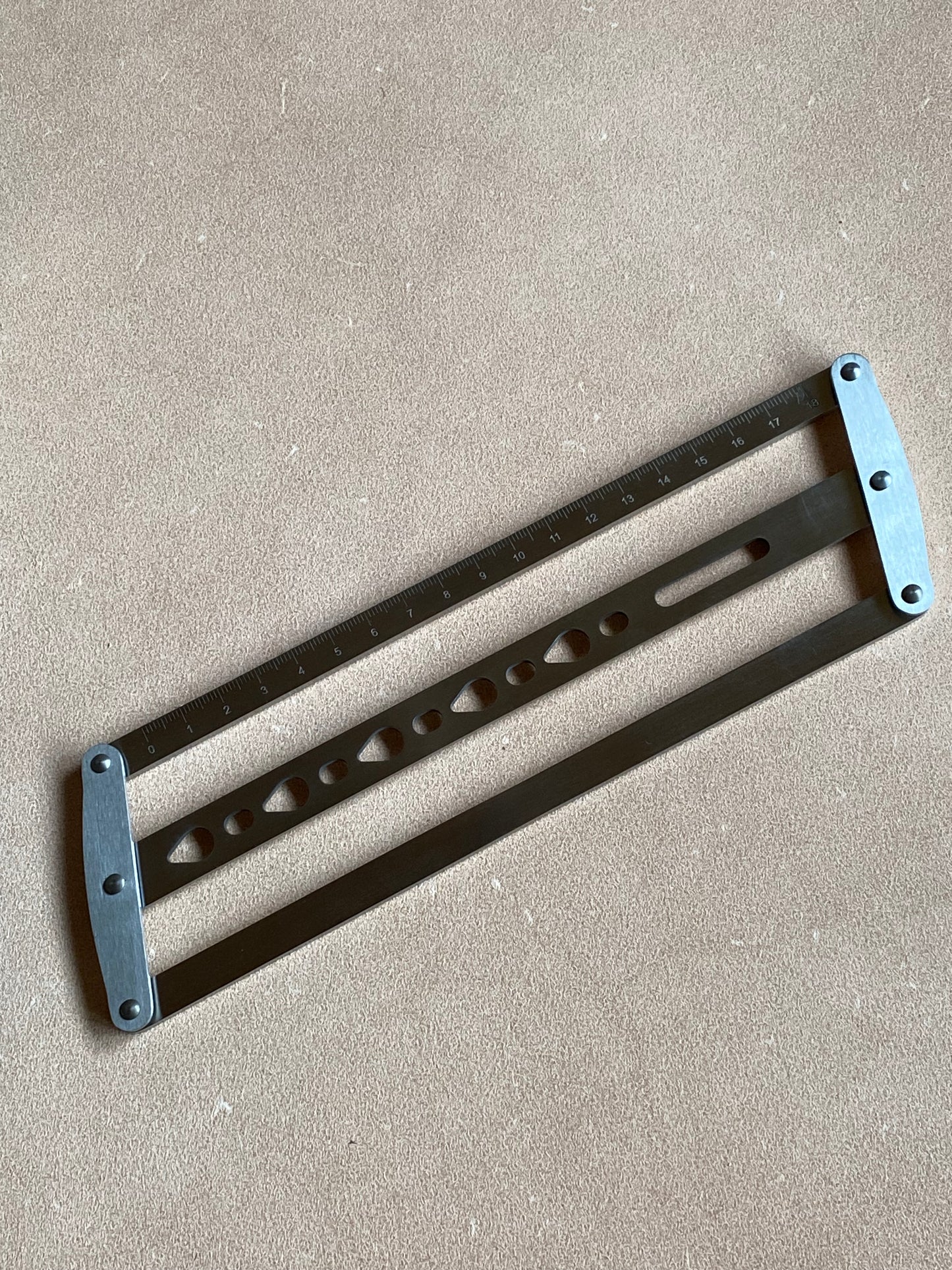 Centering ruler Metal ruler 18cm for marking the belt holes. Triangle.