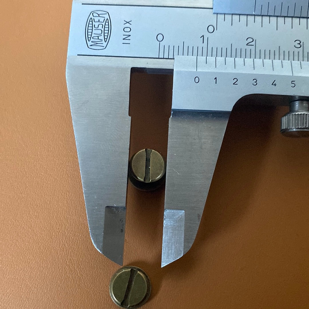 Book screw shaft 5x5 mm. Slit or cross. Sleeve head 9mm